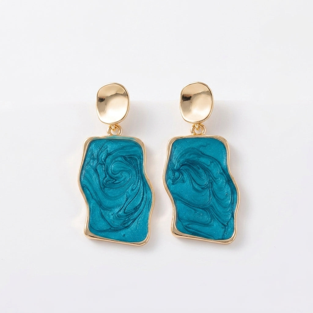 Blue marble statement drop earrings with abstract ocean-inspired pattern