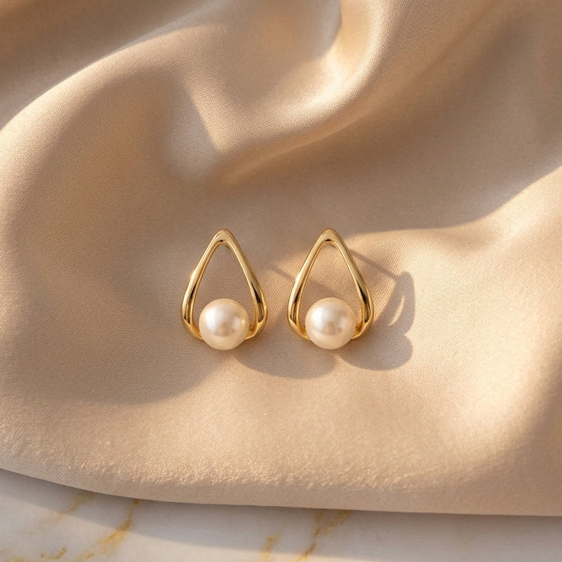 Gold-plated triangle pearl stud earrings with minimalist geometric design
